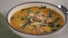 a bowl of soup with meat and vegetables