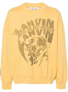 yellow cotton jersey texture floral and logo print to the front appliqué logo to the sleeve embroidered logo to the rear round neck drop shoulder long sleeves ribbed cuffs and hem fleece lining When buying this unisex item, keep in mind that it is graded in standard men's sizing. Yellow Letter Print Sweatshirt For Fall, Oversized Hoodie With Logo And Crew Neck, Spring Crew Sweatshirt With Logo Print, Spring Crew Sweatshirt With Logo Detail, Oversized Logo Sweatshirt For Fall, Oversized Yellow Sweatshirt With Letter Print, Trendy Sweatshirt With Logo Detail, Trendy Yellow Crew Neck Sweatshirt, Trendy Long-sleeved Sweatshirt With Logo Detail