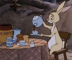 a cartoon rabbit is pouring coffee at a table