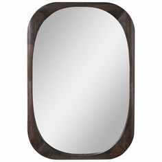 a wooden frame mirror on a white background