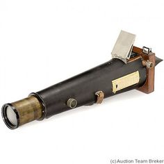 an old fashioned telescope is shown on a white background