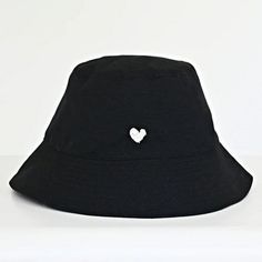 Kerri Rosenthal Women's Bucket Hat Heart In Black Cotton O/S Msrp $128.00 Block The Sun In Style With This Adorable Hat That Will Complement Any Outfit. Expertly Crafted To Elevate Your Style While Providing A Delightful Touch Of Personality. Featuring A Sleek Black Backdrop With A White Embroidered Imperfect Heart Graphic At The Front, A Smaller Brim, A Shorter Crown, And A Signature Yellow Tag Accent. Shell - 100% Cotton. Spot Clean. Measurements - 2.4" Brim, 22.5" Inner Circumference. Authent Cute Hats Black, Black Hat With Pins, Kerri Rosenthal, Pink Baseball Cap, Black Backdrop, Turquoise Cross, Elegant Hats, Warm Winter Hats, Black Backdrops