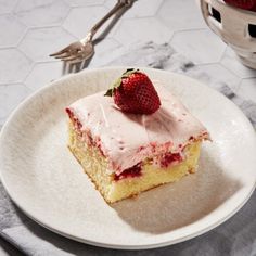 a piece of cake on a plate with a fork and knife next to the plate