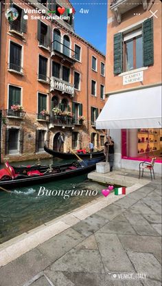 a gondola on the side of a canal in venice, italy