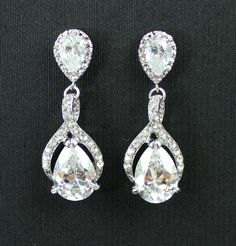 When my daughter gets married I am wearing these!!!!Bridal Crystal  Earrings BRIDE Wedding Jewelry by JamJewels1, $48.00 Elegant Teardrop Rhinestone Earrings, Elegant Teardrop Earrings With Rhinestones For Gifts, Elegant Teardrop Earrings With Rhinestones As Gift, Elegant Teardrop Earrings With Rhinestones, Formal Teardrop Rhinestone Bridal Earrings, Formal Teardrop Bridal Earrings With Rhinestones, Silver Pear-shaped Bridal Earrings For Party, Wedding Rhinestone Teardrop Earrings, Rhinestone Teardrop Earrings For Wedding