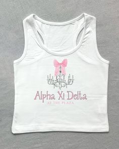 alpha xi delta at the plaza <3 ♡ NEED A BULK ORDER? We offer bulk discounts for orders over 35 shirts. Please check the last listing photo for exact pricing! We also offer this print on: SWEATSHIRTS, TEES (COMFORT COLORS OR GILDAN), AND BABY TEES. ♡ Please read full description and try not to order too close to your event! I will make sure your shirt is out by my scheduled date, but delays sometimes do happen through USPS, so please allot enough time for delivery. ♡ NO REFUNDS are accepted on sorority shirts, but please contact me if you have an error with your order. ♡ This listing comes in a cropped tank. Please check size chart for sizing info! If you would like this design on a baby tee for a bulk order, please reach out so I can accommodate that request! ♡ Please check size chart for Fancy Hotel, Sigma Delta Tau, Bid Day Shirts, Big Little Shirts, Sorority Shirt, Alpha Xi Delta, Alpha Xi, Baby Tees, Sorority Shirts