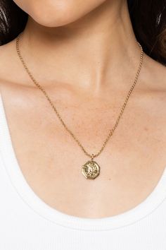 Inspired by a vintage Italian coin, the Coin Charm on our Carina Chain is sure to be your go-to. 18k gold-plated brass 17mm diameter Gold Coin Necklace, Gold Coin, Coin Necklace, Pendant Bracelet, Gold Coins, Vintage Italian, Ladies Boutique, Chain Pendants, Chains Necklace