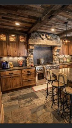 a large kitchen with wooden cabinets and an island