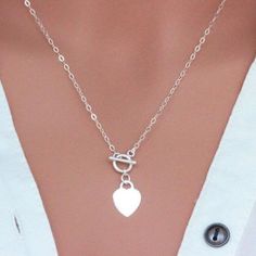 "Sterling Silver heart tag Toggle Heart Necklace All Metal Components onto Sterling Silver. ★★IT is made of .. -Sterling Silver Toggle Clasp, -Sterling Silver Heart Tag pendent , -Sterling Silver cable chain, -Total length will be 16\", 17\", 18\", 19\", 20\", 21\",or 22\",depend on customer request -Come up with ribbon gift box , free per-made massage card and -One set of Care instruction package . -it can be stamped custom initial. -All quantities are available for special occasion. MORE HEART Heart Charm Toggle Necklace For Valentine's Day Gift, Valentine's Day Toggle Necklace With Heart Charm As Gift, Valentine's Day Gift Toggle Necklace With Lobster Clasp, Valentine's Day Gift Toggle Necklace With Heart Charm, Valentine's Day Heart Necklace With Toggle Clasp, Valentine's Day Gift Toggle Necklace, Silver Heart Charm Toggle Necklace For Valentine's Day, Silver Heart Toggle Necklace For Gift, Silver Toggle Necklace With Heart Charm For Valentine's Day