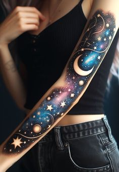 a woman's arm with stars and planets on it