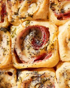 many rolls with different toppings are arranged in a square pattern on top of each other