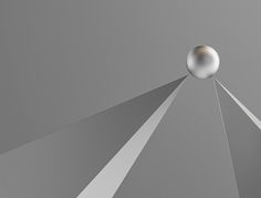 an image of a silver object in the air with light coming from it's center