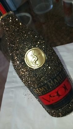 a close up of a bottle of wine on a table