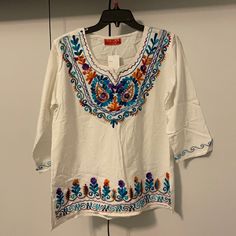 Beautiful Handmade Embroidered Top White In Mxico Sz M White Embroidered Blouse For Vacation, White Embroidered Hem Blouse For Vacation, White Casual Top With Floral Embroidery, White Cotton Embroidered Casual Top, White Cotton V-neck Embroidered Top, White Embroidered Blouse For The Beach, White Embroidered Hem Top For Beach, Casual White Cotton Embroidered Top, White Tops With Embroidered Hem For Beach