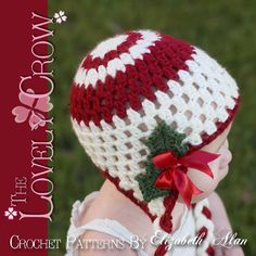 a baby wearing a crochet christmas hat