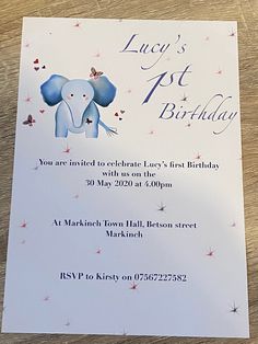 an elephant birthday party card on a table