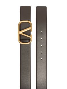 Picture this: you're stepping out in your favourite outfit, but something's missing. Could it be a touch of luxury? This belt, in its bitter chocolate and black shade, is just the ticket. Crafted from 100% Valentino Garavani leather, it's the ideal way to elevate your look. Size: 85 perfect to cinch in the waist or add structure to loose-fitting outfits Color: Bitter Chocolate/Nero (NM8), a versatile hue that suits any color palette Composition: 100% Valentino Garavani leather, adding a touch of Valentino Belt, Bitter Chocolate, Leather Cap, Pumps Flat, Dark Brown Leather, Buckle Belt, Leather Buckle, Small Handbags, Browning