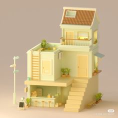 a small model house with stairs leading up to the second floor