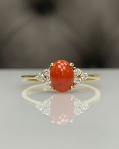 For more gorgeous jewelry, please visit : https://www.etsy.com/shop/MastikaJewelry Certificated Coral with Diamond Dainty Classic Engagement Ring in 14K Solid Gold, Cocktail Cluster Ring, Genuine Gemstone, Best Gift Idea ◎ Details ◎ ○ Gemstone Details .Natural CERTIFICATED CORAL Oval Cut approx 7x5 mm approx. 0.70 ct .Conflict Free DIAMOND Round Cut 1.70 mm 6 pcs F/G VS/SI total approx. 0.10 ct ○ Gold Details 14K Solid Gold Weight of Ring : approx 2.00 gr Made to Order HANDMADE ITEM ○ Upgrade to Pagadam Rings For Women, Elegant Gold Jewelry With Red Coral, Elegant Coral Oval Rings, Coral Engagement Ring, Coral Ring Designs For Women, Red Coral Ring Design Women, Coral Rings, Pearl Ring Design, Coral Stone Ring