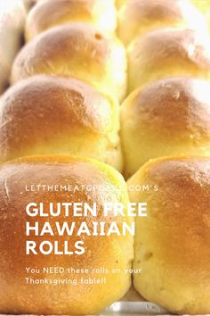 a bunch of bread rolls sitting on top of a pan with the words gluten free hawaiian rolls