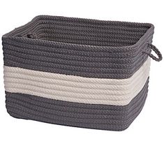 a gray and white striped basket with handles