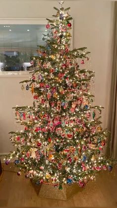 a decorated christmas tree in a living room