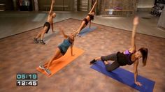 a group of women doing yoga poses in a studio