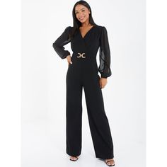 Make a statement in this black chiffon palazzo jumpsuit, featuring a flattering buckle waist detail and wide leg design. The chiffon material gives a floaty and feminine touch, perfect for any occasion. With its versatile design, you can dress it up with heels or keep it casual with sandals. Palazzo Jumpsuit, Formal Jumpsuit, Wrap Jumpsuit, Jumpsuit Online, Black Chiffon, Jumpsuit Party, Chiffon Material, Jumpsuit With Sleeves, Leg Design