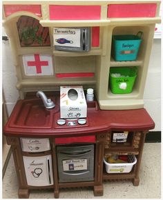 a play kitchen with lots of different items in it