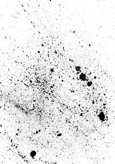 black and white ink splattered on paper