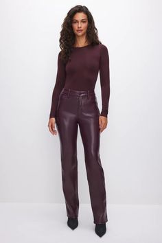 This is the straight pant of your dreams. Pairs perfectly with heels, fitted through the hips, with an iconic straight leg opening. Your everyday straight, now in our fan favorite Better Than Leather material. Straight leg High Waist Better Than Leather material - thick faux leather Burgundy color Heavy weight fabric- our thickest faux leather is structured and ultra luxe Inseam: 32" Fabric: 100% Polyurethane Care: Dry Clean Best Icons, Leather Pant, Perfect Pant, Faux Leather Pants, Malbec, Good American, Nice Leather, Burgundy Color, Pair Of Pants