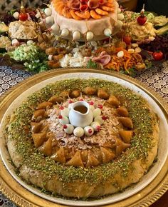 an elaborately decorated cake sits on a table