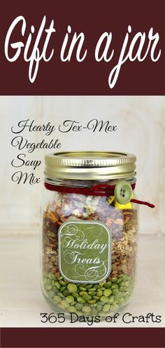 a jar filled with green beans and other things to make it look like a gift in a