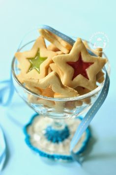 star shaped cookies in a glass bowl on a table