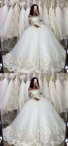 a woman in a white wedding dress sitting on the floor with her hands behind her head