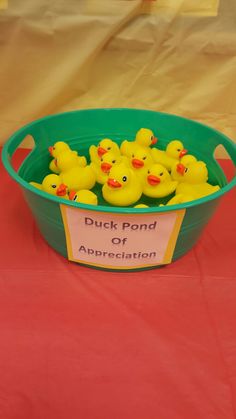 there are many rubber ducks in the tub