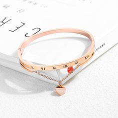 Product name: Rose Gold Women's Roman Numeral Bracelet Material: Titanium steel，Zircon Size: perimeter 165mm Packaging: gift box Color: rose gold Product weight: 14g Remarks Statement: We use vacuum furnace electroplating for color plating, and the material is also selected 316 titanium steel, no discoloration, no rust, no allergy, no black, wear-resistant, green and environmental protection Layered Bangles, Roman Numeral Bracelet, Black Wear, H Bracelet, Packaging Gift, Bangle Bracelets With Charms, Roman Numeral, Charm Bangle, Box Color