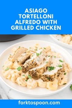 two white plates filled with pasta and chicken on top of a blue background text reads asiago tortellini alfredo with grilled chicken