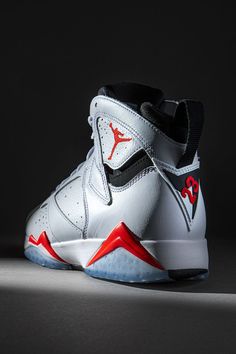 Originating on the Air Jordan 6, the “White/Infrared” color story now appears on the Air Jordan 7 for the first time in the model’s history some three decades after its debut. Clearly, an old dog can learn a new trick. Shop the release at Stadium Goods. White Basketball Shoes With Contrast Sole, White Basketball Shoes With Contrast Sole For Sports, Modern White Jordan Sports Shoes, Sporty White Jordan Shoes With Contrast Sole, White Jordan Shoes With Contrast Sole For Sports, White Leather Basketball Shoes For Streetwear, Dynamic White High-top Sneakers With Boost Midsole, White Sporty Jordan Shoes With Contrast Sole, Modern White Leather Basketball Shoes