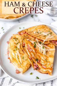 ham and cheese crepes on a white plate