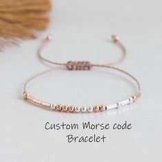 Dainty personalized Morse code bracelet - special gift with your custom secret message!  ✦ Makes a great gift for sister, best friend, mom, wife, aunt, bridesmaid ✦ Adjustable up to approx 9 3/4 inches (25cm) with sliding knot ✦ 925 Sterling Silver beads ✦ 925 Sterling Silver 18K Rose Gold beads ✦ Round beads represent dots, tubes dashes ☆ Find more Morse code bracelets: https://www.etsy.com/shop/ANINAjewelry Thank you for stopping by :) Mores Code Bracelets, Secret Message Jewelry, Morse Code Bracelets, Code Bracelets, 1st Mothers Day, Mens Bracelet Personalized, Valentines Bracelets, Sister Bracelet, Step Mom Gifts