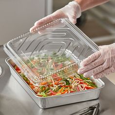 Keep delicious meals-to-go perfectly secured and oven-ready in this Choice 108 oz. smoothwall silver extra large foil entree / take-out pan with dome lid. Whether your customers are taking home leftovers from your restaurant or buying a ready to cook meal, this take-out container is the perfect choice. The smoothwall foil is puncture-resistant to ensure that your food stays secure and will not leak out. In addition, the ribbed PET plastic lid fits securely onto the edge of the pan creating a cle