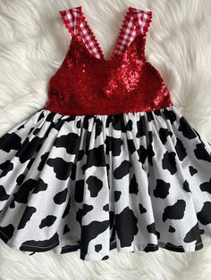 Cow Print Dress, Baby Cow Print Dress, Cow Theme Party Dress,  Farm Theme Party Dress, Toddler Cow Print Dress, Birthday, Sequin Dress Processing Time: 3-5 Business Days from date of purchase.  Please note, shipping time is aside from processing time, items are shipped via USPS.  Machine wash cold, and hang dry.  If you have any custom sizing request, please message us prior to purchase, we are open to making per measurements- needed: Bust, waist, and hem length. ang dry .  No returns or exchang Birthday Sequin Dress, Cow Print Dress, Baby Cow, Baby Cows, Farm Theme, Dress Birthday, We Are Open, Toddler Dress, Cow Print