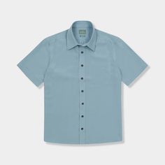 From GenTeal: "The vintage-styled Palmas Shirt is a short-sleeve button-up that is made to be worn untucked and by the water. Made with a unique blend of modal and polyester, it offers durability and comfort." 75% Modal, 25% Polyester Genuine horn buttons 8-button front Light Blue Short Sleeve Shirt For Summer, Light Blue Short Sleeve Summer Shirt, Light Blue Summer Shirt With Pockets, Light Blue Shirt With Pockets For Summer, Summer Half Sleeve Shirt With Placket, Summer Half-sleeve Shirt With Placket, Light Blue Shirt With Relaxed Fit And Spread Collar, Summer Washed Blue Button-up Shirt, Washed Blue Button-up Shirt For Summer