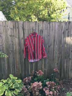 This is an amazing top that is ready to make your life perfect. If you want to have the perfect 90's look, pair this top with some light wash relaxed fit denim and you are good to go. It is in great condition and has no rips, holes, stains or smells. Measurements: Pit to pit: 23 1/2 inches Collar to bottom front: 26 1/2 inches Collar to bottom back: 30 1/2 inches Sleeve Length (from collar): 29 1/2 inches Size on tag: Medium (fits oversize) Oversized Red Casual Blouse, Casual Red Oversized Blouse, Red Relaxed Fit Top With Button Closure, Oversized Red Button-up Tops, Oversized Red Tops With Button Closure, Red Oversized Top With Button Closure, Oversized Retro Red Top, Retro Red Oversized Top, Painters Pants