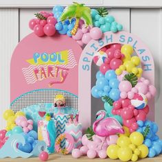 there is a pool party with flamingos and balloons