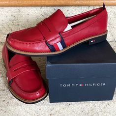 Tommy Hilfiger Karvel- Classic Penny Loafer In Brand New Condition. Size 6.5m. These Shoes Are Beautiful But Did Not Fit Me Right For Some Reason So Pick Them Up And Enjoy! Classic Logo Stripe Penny Keeper Strap Leather Upper, Rounded Toe Box Included Fast Shipping From A Smoke Free Home. Casual Flats With Red Sole For Workwear, Casual Workwear Flats With Red Sole, Casual Loafers With Red Sole And Almond Toe, Casual Red Loafers For Office, Casual Red Flats For Work, Red Low-top Loafers For Spring, Classic Red Plain Toe Loafers, Red Slip-on Low-top Loafers, Rain Sneakers