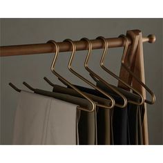 an image of clothes hanging on a rail