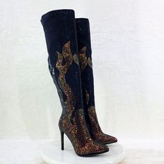 Full Body Rhinestone Boots With Flame Design 4.5" Stiletto Heels Over The Knee Height Pointed Toe Pull On With Partial Side Zipper Approx. Measurements Top Opening 18" Calf 15.5" Total Height Including Heel 24" Brand New In Original Box Authentic Brand Sourced Directly From Manufacturer Pictures Taken With And Without Flash Glamorous Thigh-high Party Boots, Glamorous High Heel Knee-high Boots For Night Out, Elegant Rhinestone Knee-high Boots For Party, Embellished Fitted Boots For Night Out, Fitted Embellished Boots For Night Out, Rhinestone Knee-high Boots For Party, High Heel Knee-high Boots With Rhinestones For Party, Rhinestone Knee-high Boots For Winter Parties, Winter Party Knee-high Boots With Rhinestones