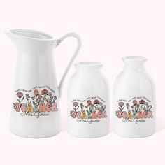 three vases with flowers painted on them and the words tea maker next to each other